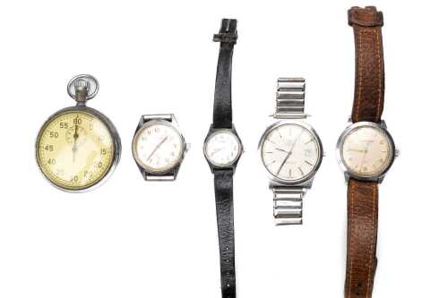 A collection of four vintage watches and a stopwatch
