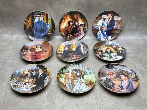 Nine 'Scarlett and Her Suitors' collector plates with wall attachment