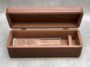 Games, including Two-Up in timber case - 2