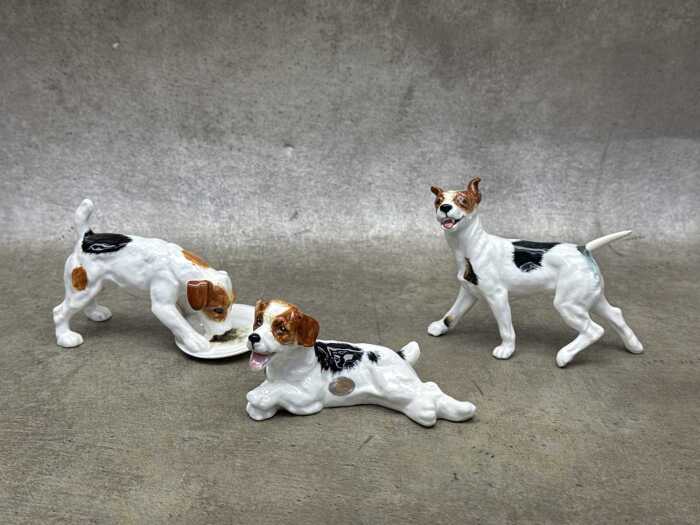 Three Royal Doulton 'Dog of Character' porcelain figures