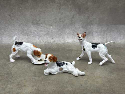 Three Royal Doulton 'Dog of Character' porcelain figures
