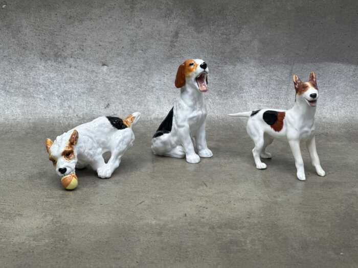 Three Royal Doulton 'Dog of Character' porcelain figures