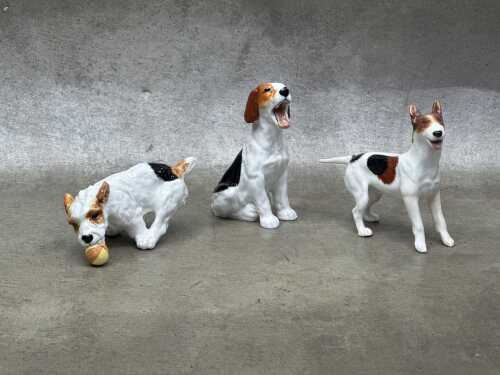 Three Royal Doulton 'Dog of Character' porcelain figures