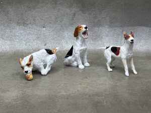 Three Royal Doulton 'Dog of Character' porcelain figures