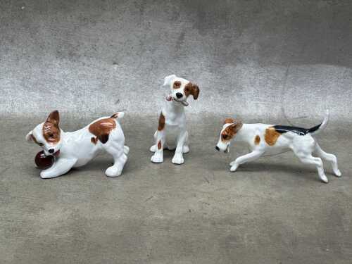 Three Royal Doulton 'Dog of Character' porcelain figures