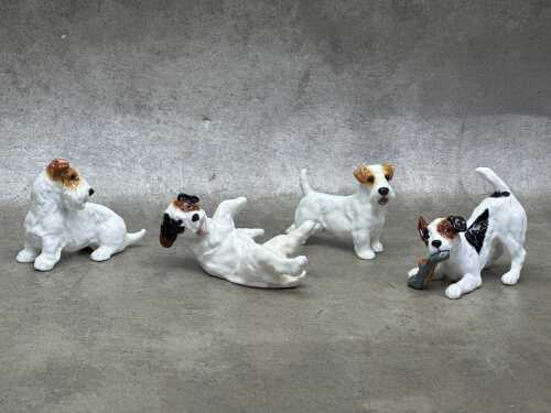 Four Royal Doulton 'Dog of Character' porcelain figures