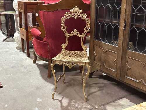 Antique gold cast iron chair