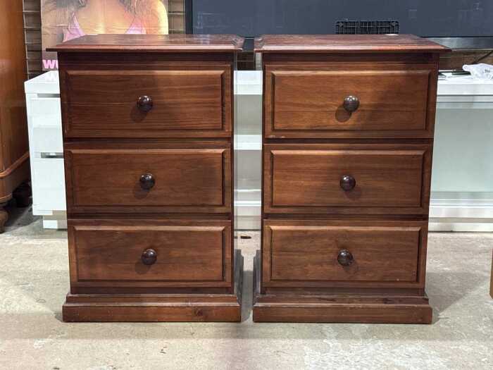 Pair of pine three-drawer bedside cabinets