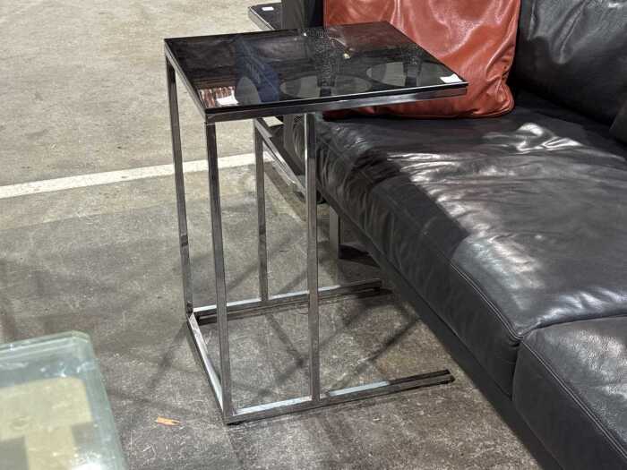 Brushed aluminium side table with black glass top