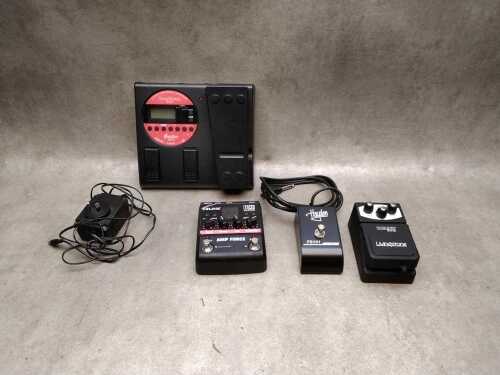 Two guitar effects pedals and one processor