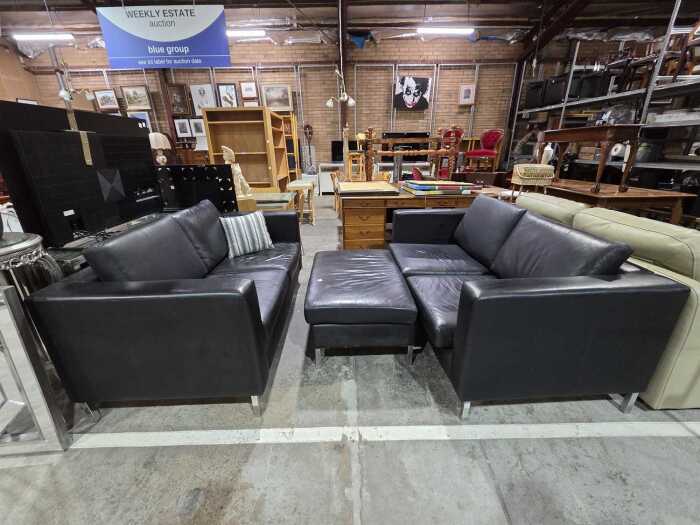 Berkowitz black leather three-piece lounge suite