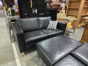 Berkowitz black leather three-piece lounge suite - 2