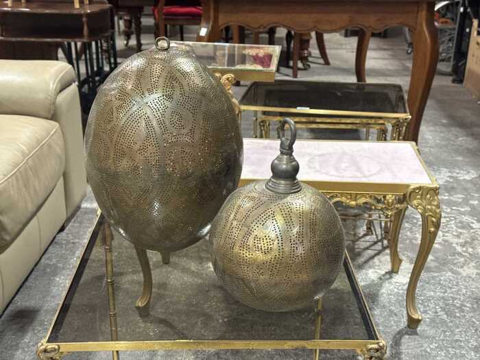 Two Moroccan style metal hanging decorative balls