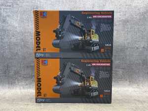Two Hengjian model RC excavators