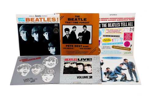 Six Beatles vinyl records