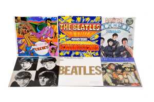 Six Beatles vinyl records