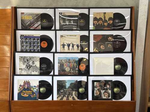 Set of twelve framed Beatles album covers