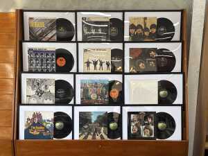 Set of twelve framed Beatles album covers