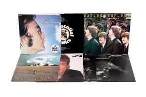 Eight Beatles and John Lennon vinyl records