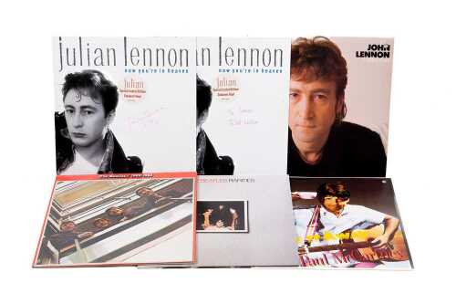 Six Beatles and Family vinyl records, including promos and signed 12" singles