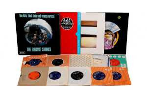 Four Rock LPs, together with a group of 45rpm 7" singles