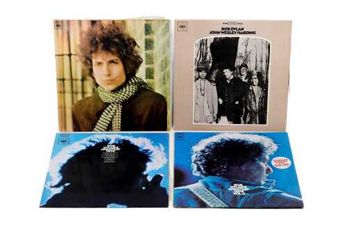 Four Bob Dylan vinyl records