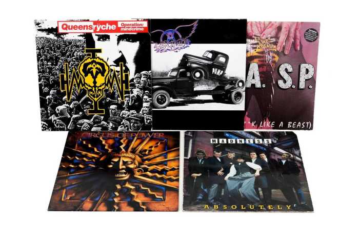 Five vinyl records, mostly hard rock and metal