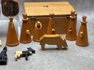 Assorted treen including carved Nativity figures in cabinet, turned Mulga wood vases, etc. - 2