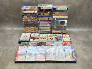 Group of VHS tapes, mainly nostalgia movie titles, including Marx Brothers