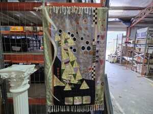 Hand embroidered chain stitch tapestry with hang rail