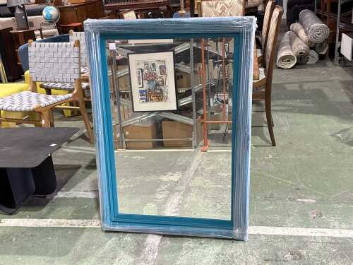 Teal framed wall mirror