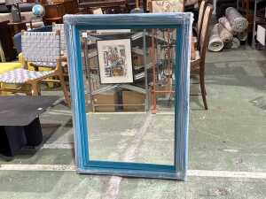 Teal framed wall mirror