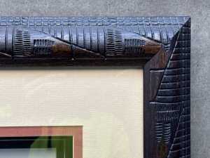 'The Migration, twelve graduated carved timber elephants in shadow box - 2