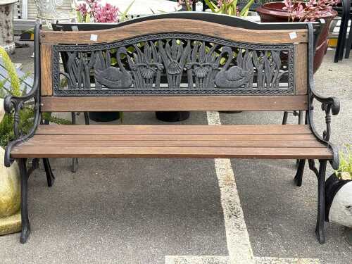 Two-seater timber and cast iron garden bench