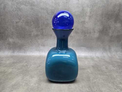 Vintage cased-glass decanter in teal with blue glass ball stopper
