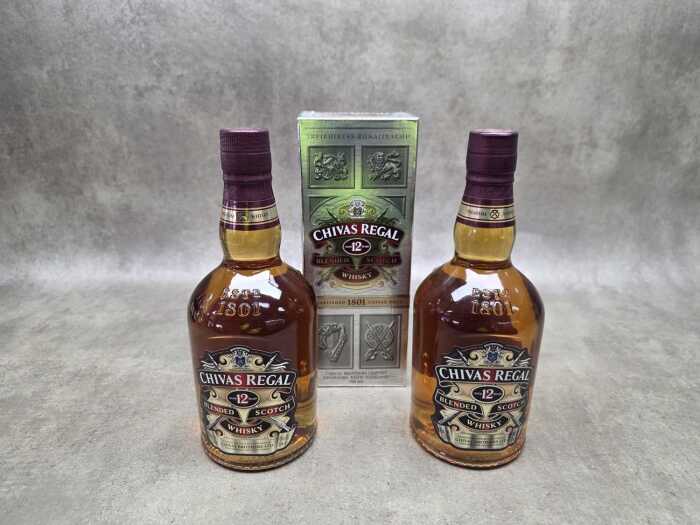 Two bottles of Chivas Regal 12 year old blended scotch whiskey