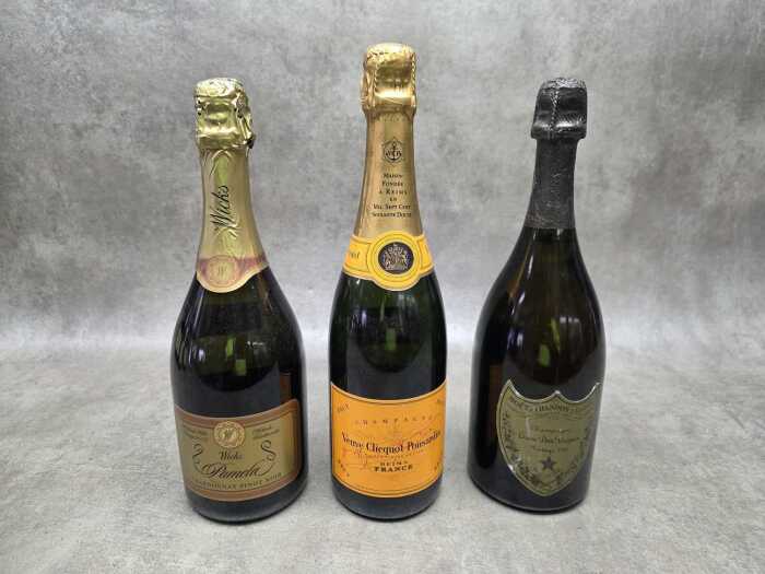 Three bottles of sparkling wine, including Dom P&eacute;rignon 1988