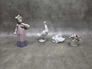 Three Nao by Lladro porcelain figures, plus a floral pot