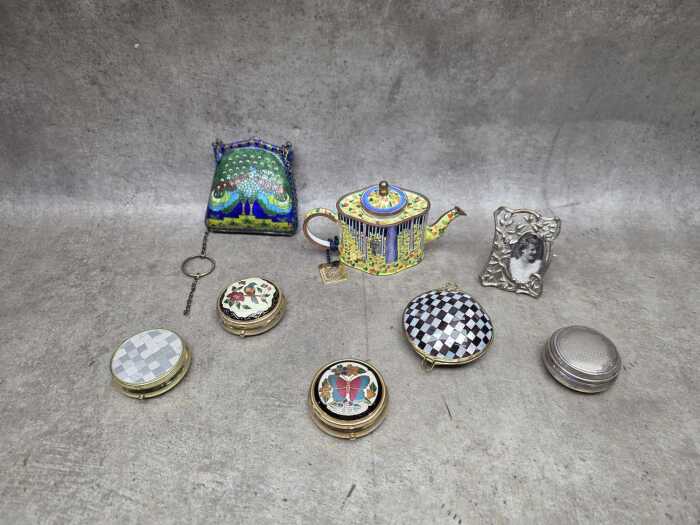 Eight metal decorative items, including enamel