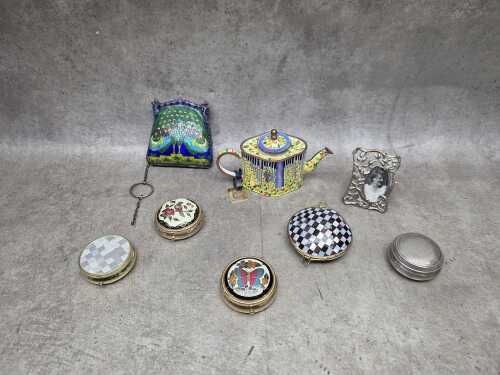 Eight metal decorative items, including enamel