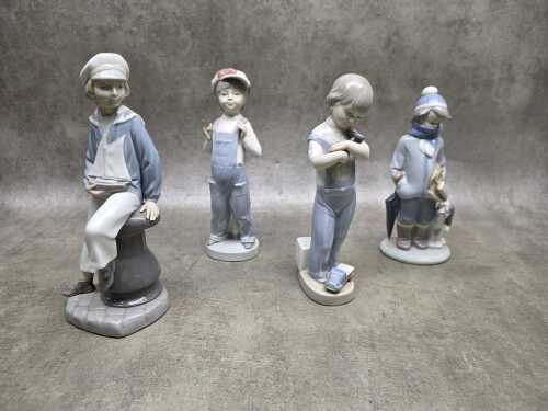 Four Lladro porcelain boy figures