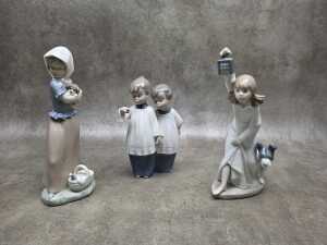 Three Nao porcelain figures