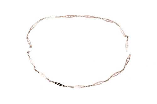 A broken necklace in 9ct rose gold