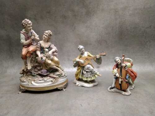 Three Italian porcelain figures playing instruments