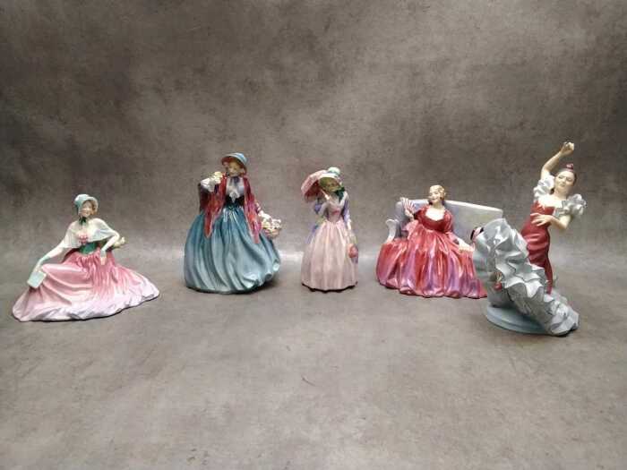 Five Royal Doulton porcelain lady figures, A/F