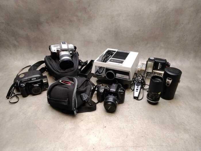 Film cameras and accessories including Minolta
