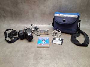Two Olympus digital cameras