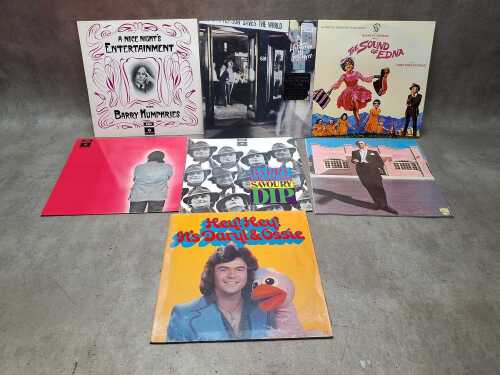 Seven Australian comedy vinyl records, including 'Hey Hey It's Daryl and Ozzie'