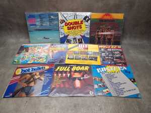 Ten Rock and Pop compilation vinyl records, including 'Hit Wave 82'