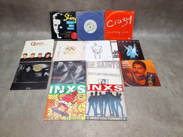 45rpm 7" vinyl singles, mostly with picture sleeves, including INXS, U2, Icehouse
